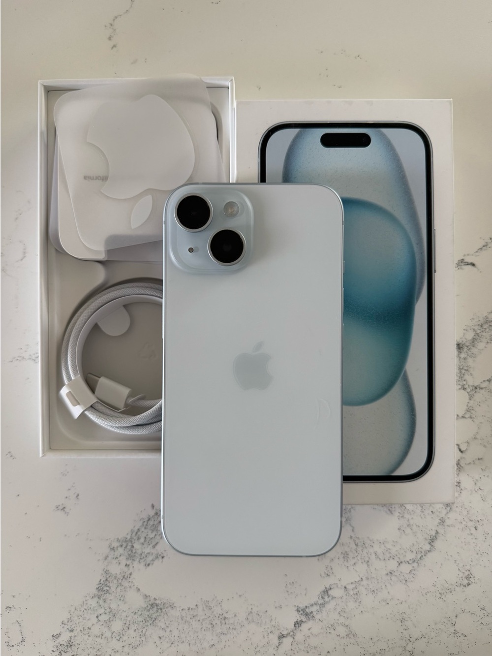 Apple iPhone 15 (Blue) with Charging Cable and Box